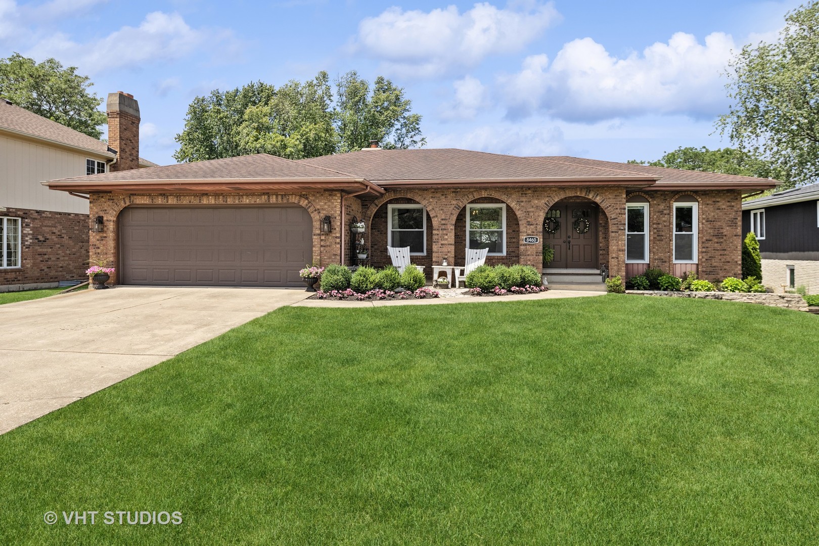 8460 Dolfor Cove Burr Ridge, IL 60527 - Photo 29 of 32 a front view of house with yard and green space