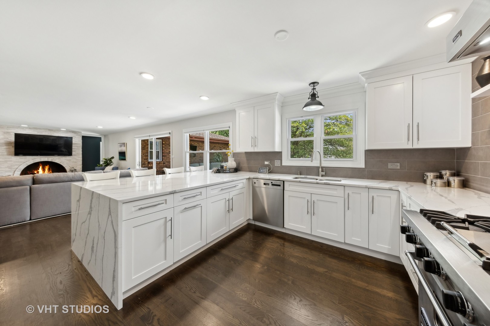 8460 Dolfor Cove Burr Ridge, IL 60527 - Photo 5 of 32 a kitchen with stainless steel appliances granite countertop a stove oven and a refrigerator