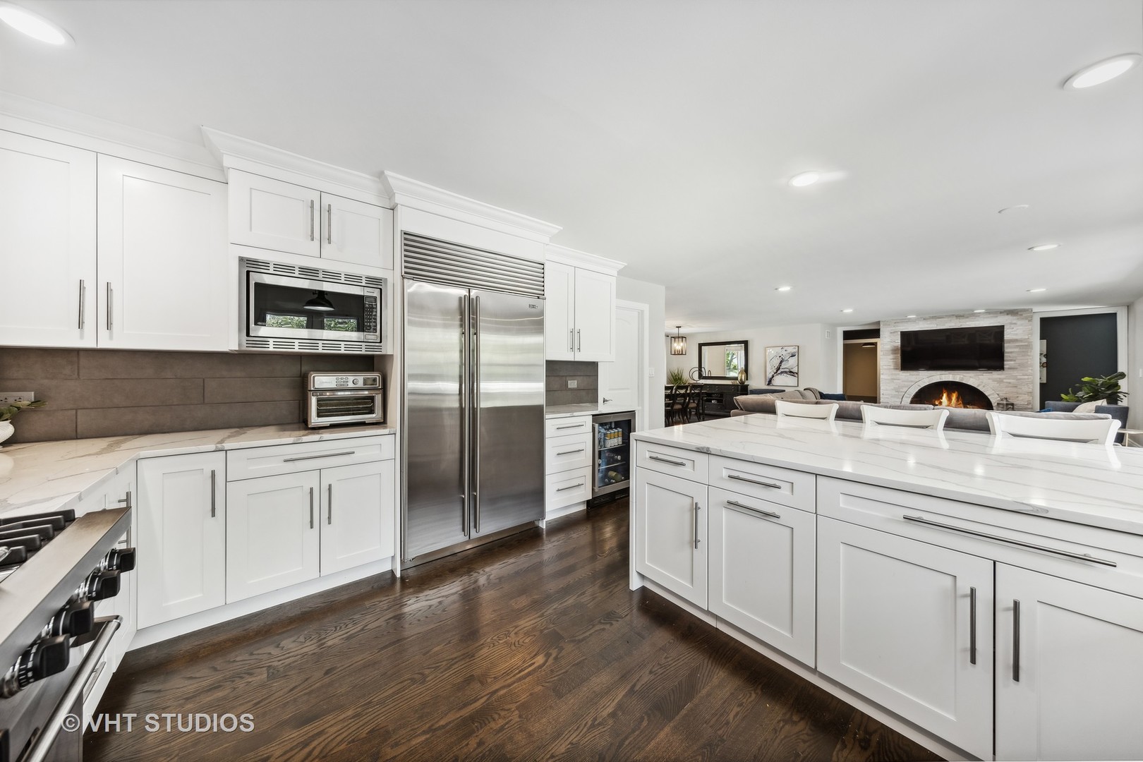 8460 Dolfor Cove Burr Ridge, IL 60527 - Photo 6 of 32 a kitchen with stainless steel appliances granite countertop a refrigerator sink and microwave