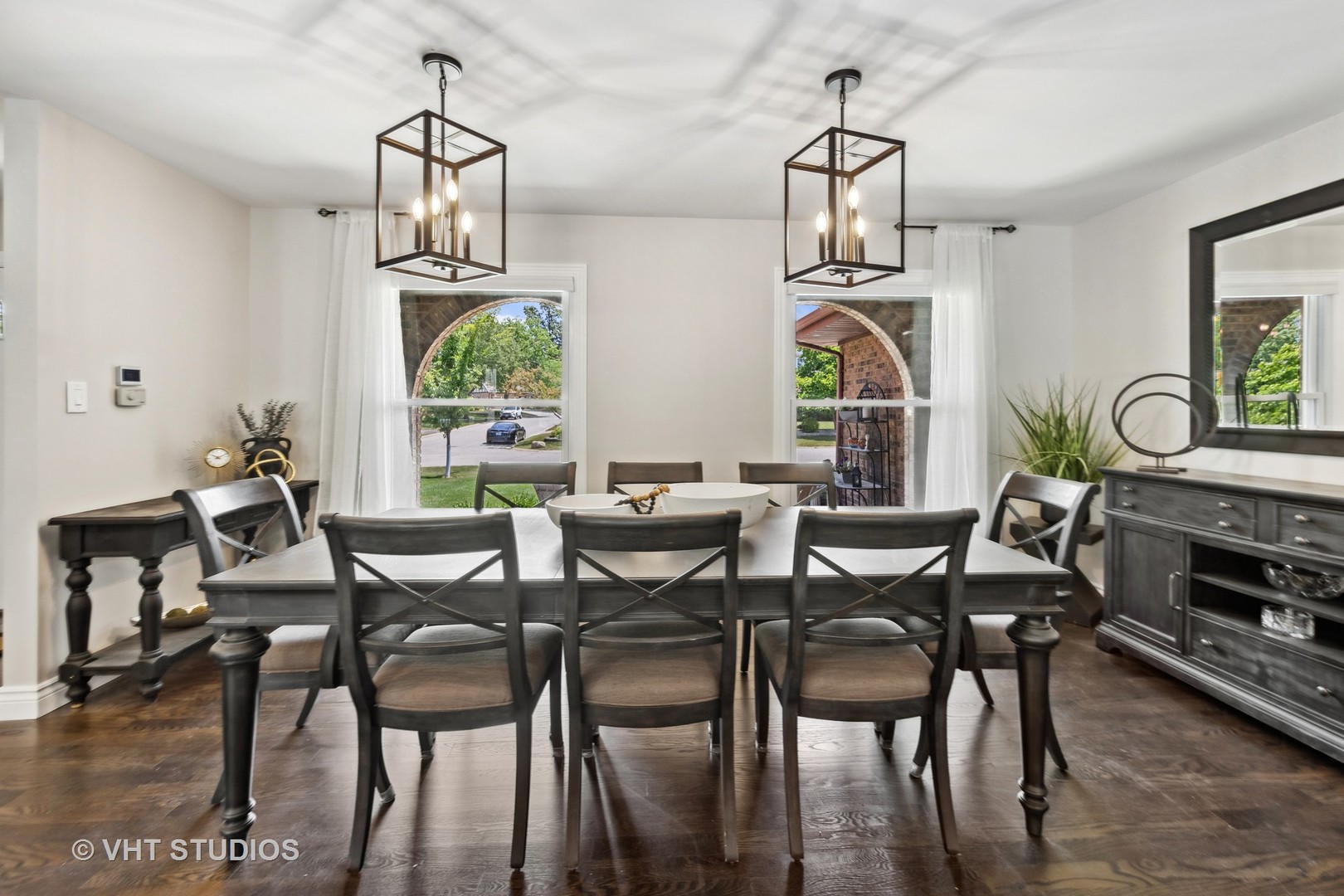 8460 Dolfor Cove Burr Ridge, IL 60527 - Photo 10 of 32 a view of a dining room with furniture window and wooden floor