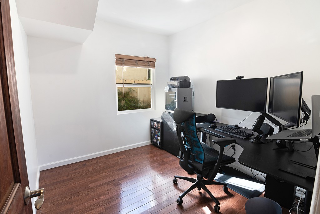 1935 Summit Avenue Pasadena, CA 91103 - Photo 11 of 27 a view of workspace with wooden floor windows
