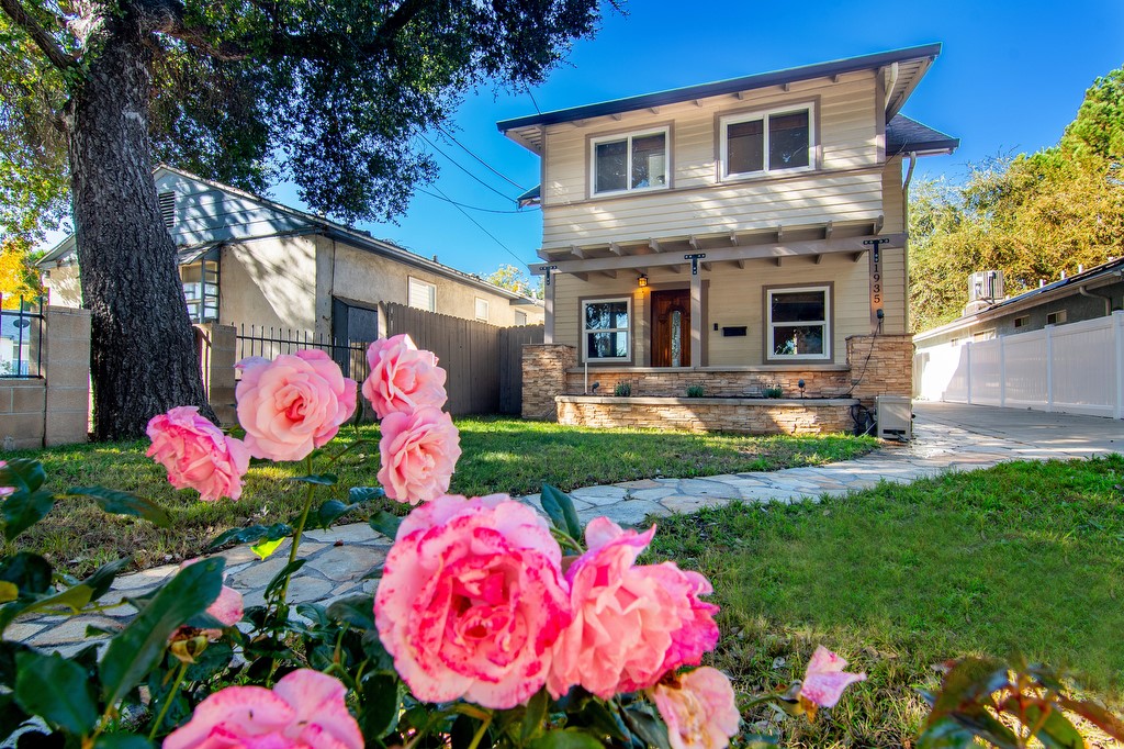1935 Summit Avenue Pasadena, CA 91103 - Photo 27 of 27 a front view of a house with yard
