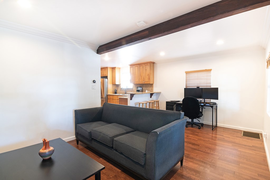 1935 Summit Avenue Pasadena, CA 91103 - Photo 4 of 27 a living room with furniture and a wooden floor