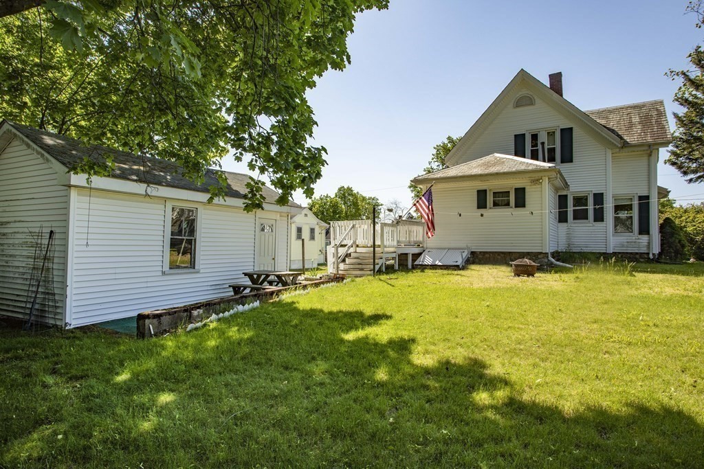 28 Augustine Street Brockton, MA 02301 - Photo 31 of 34 a front view of a house with a yard