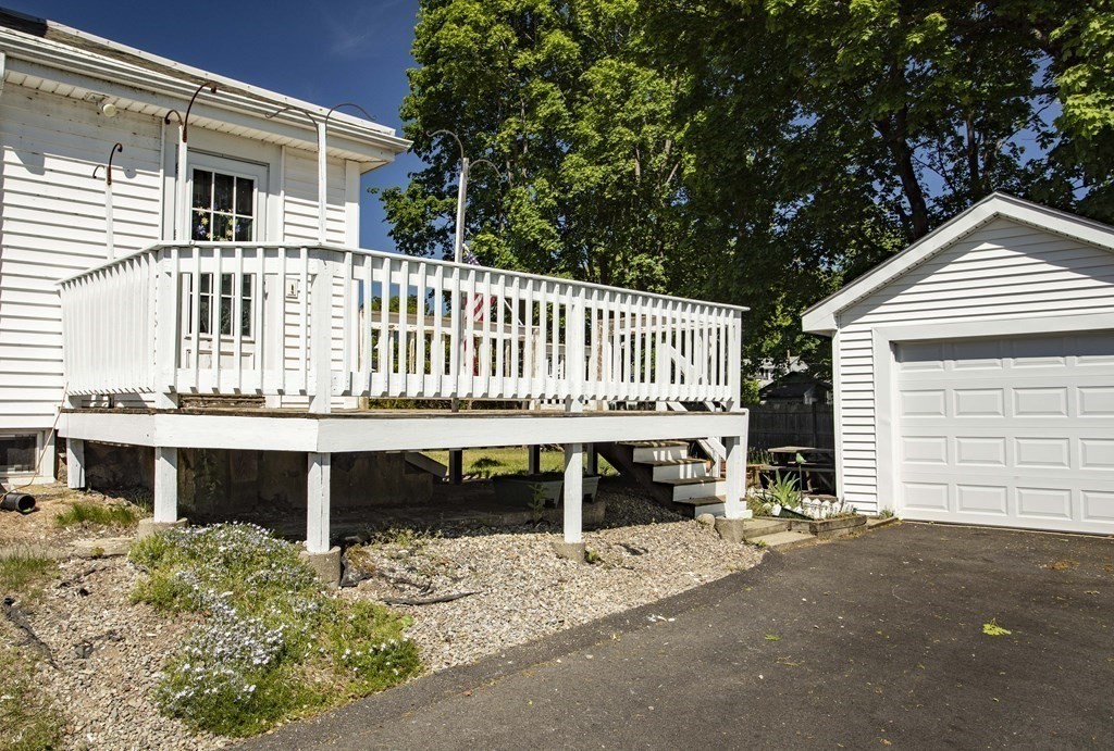 28 Augustine Street Brockton, MA 02301 - Photo 4 of 34 a view of a house with a wooden deck