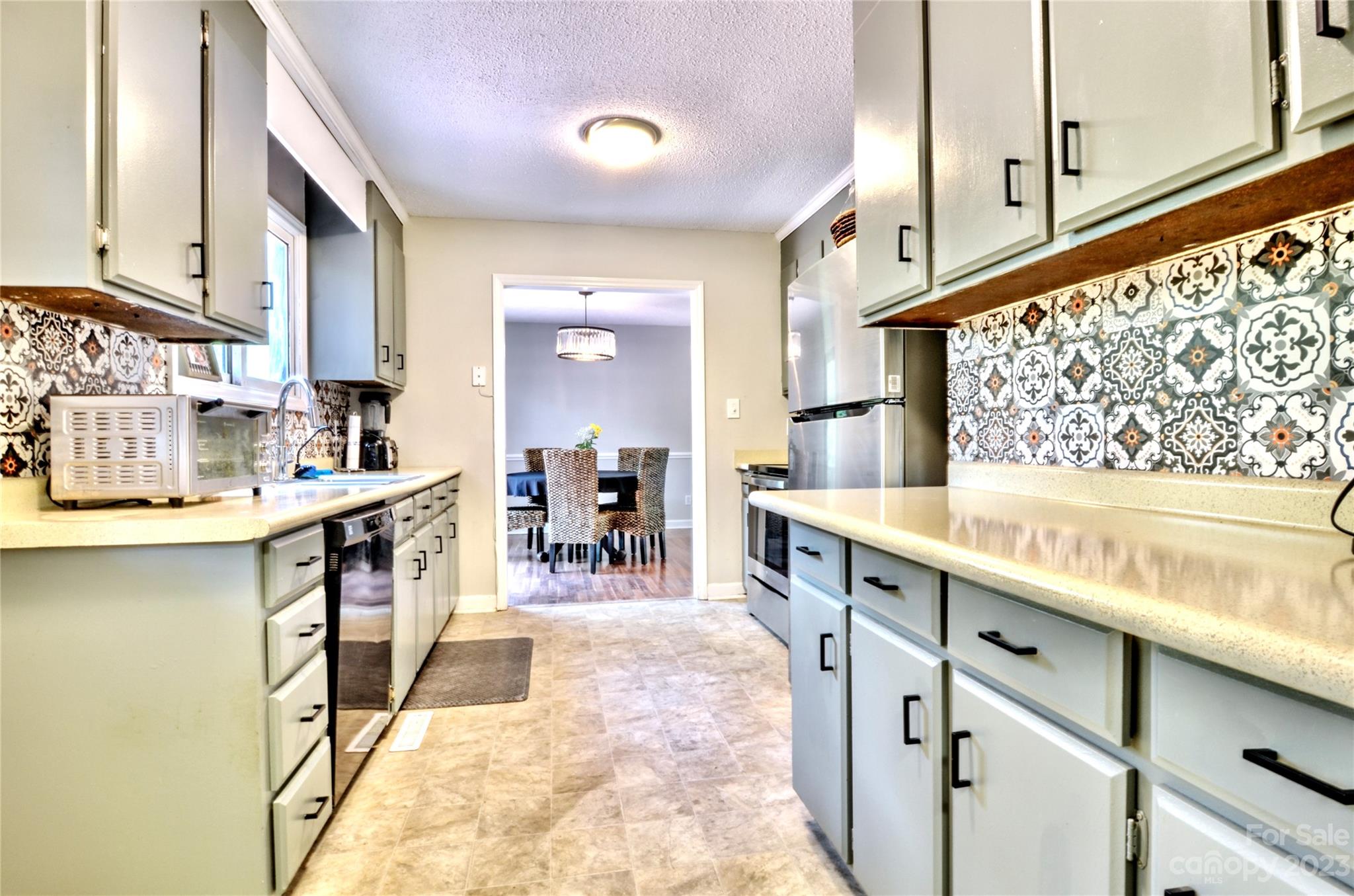 2605 Bob White Circle Wingate, NC 28174 - Photo 12 of 25 a kitchen with counter top space and cabinets