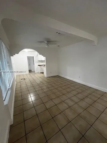 a view of a livingroom and entryway