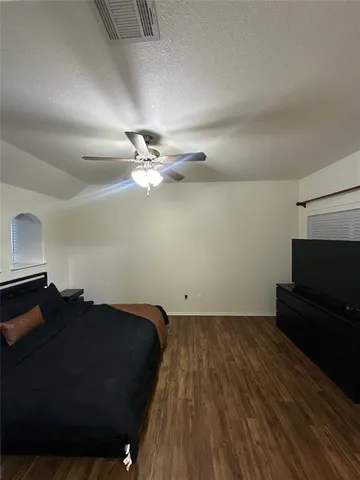 a bathroom with a double vanity sink and mirror