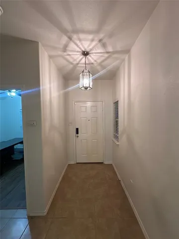 a workspace with furniture and wooden floor