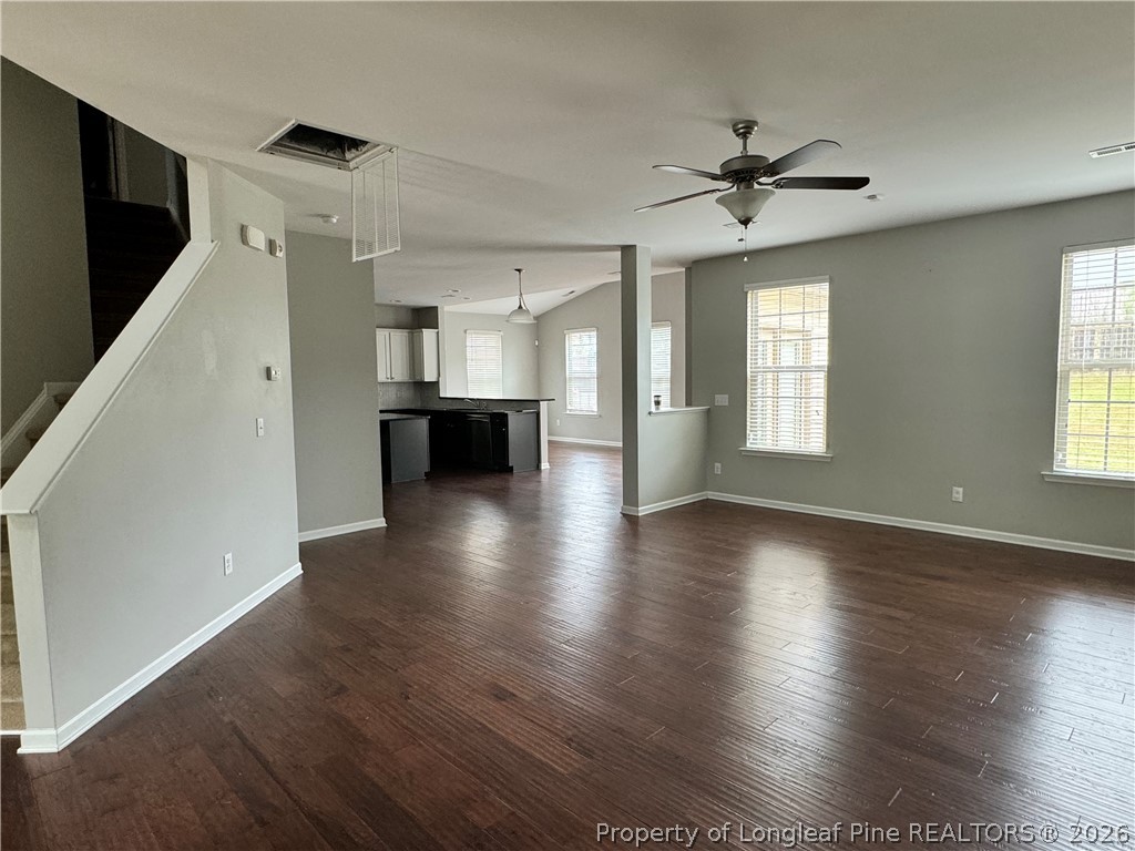 350 River Oak Street Spring Lake, NC 28390 - Photo 7 of 27 a view of an empty room with wooden floor and a window