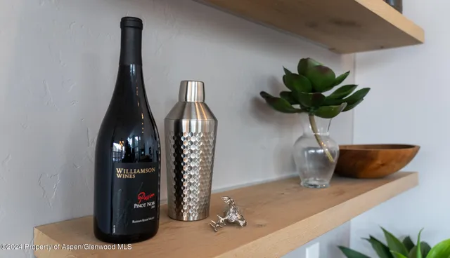 a vase of flowers sitting on a table