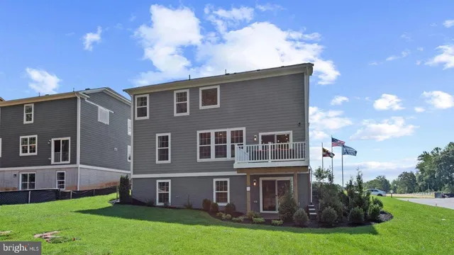 front view of a house and a yard