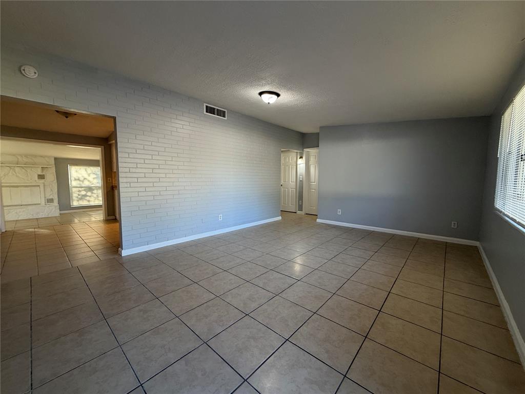 4117 Highland Loop New Port Richey, FL 34652 - Photo 2 of 12 a view of an empty room and window
