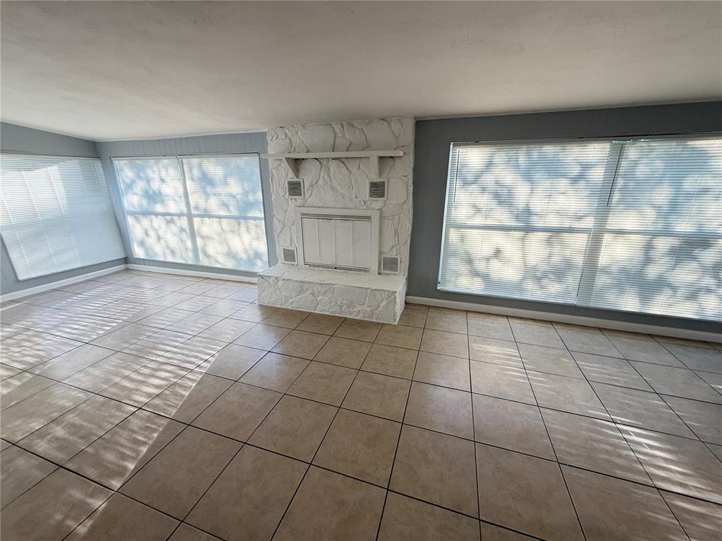 4117 Highland Loop New Port Richey, FL 34652 - Photo 9 of 12 a view of an empty room with a window