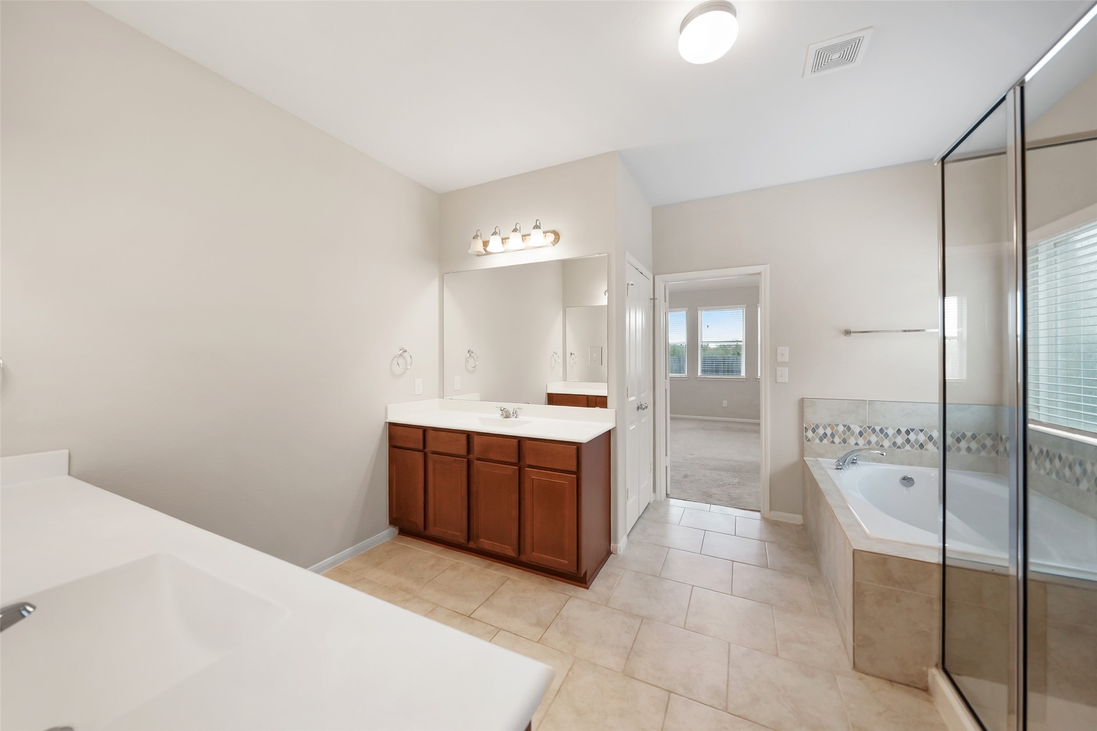 234 Ashley Way Alvin, TX 77511 - Photo 26 of 42 Separate vanities and sinks