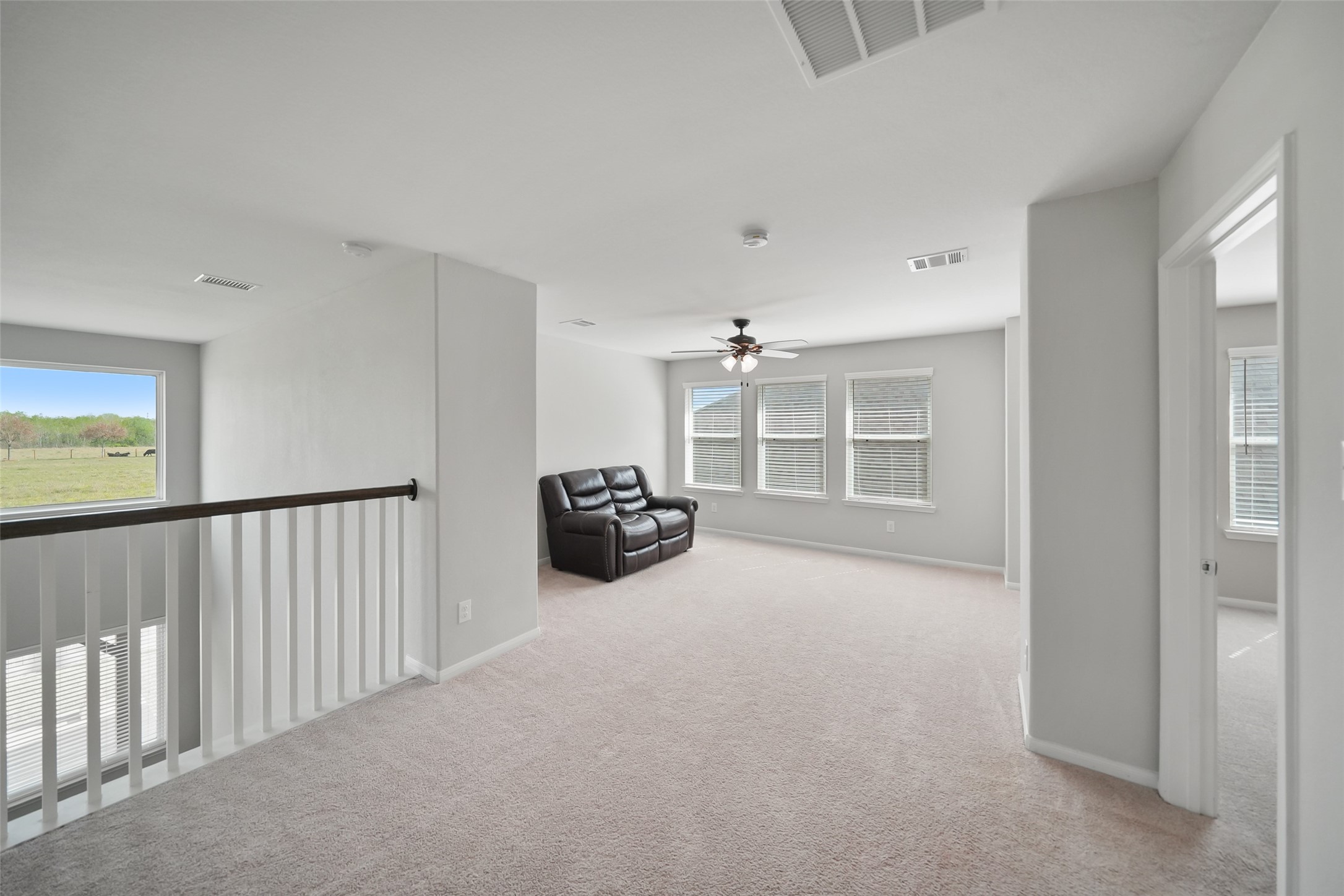 234 Ashley Way Alvin, TX 77511 - Photo 28 of 42 a view of a big room with closet and windows