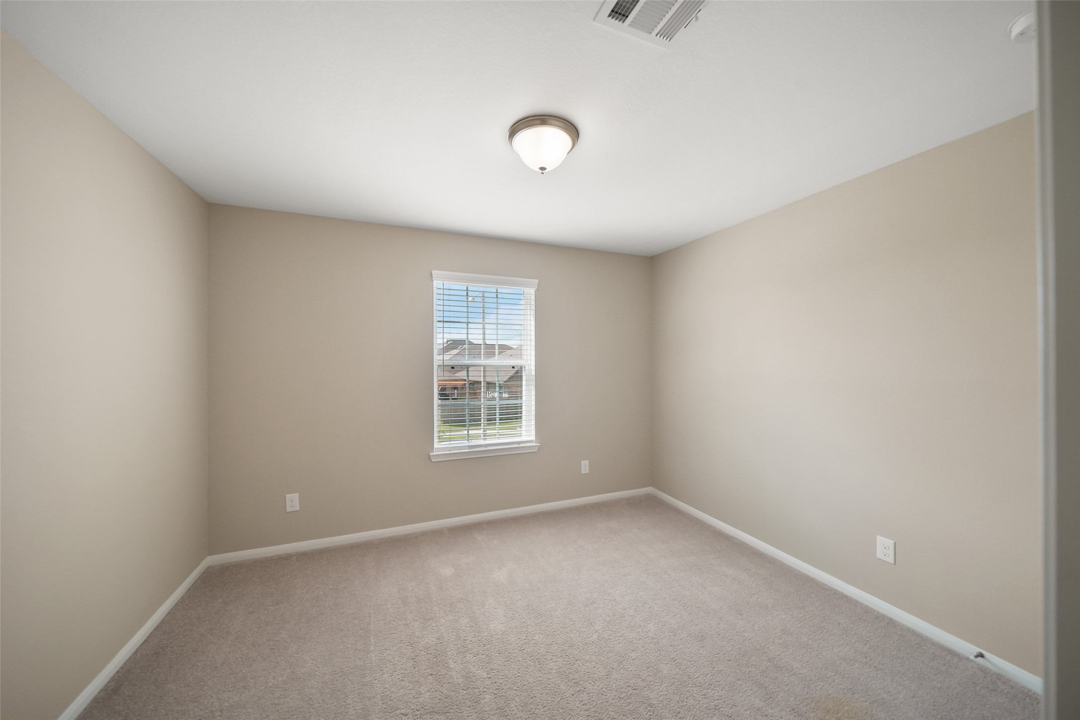 234 Ashley Way Alvin, TX 77511 - Photo 36 of 42 an empty room with a window