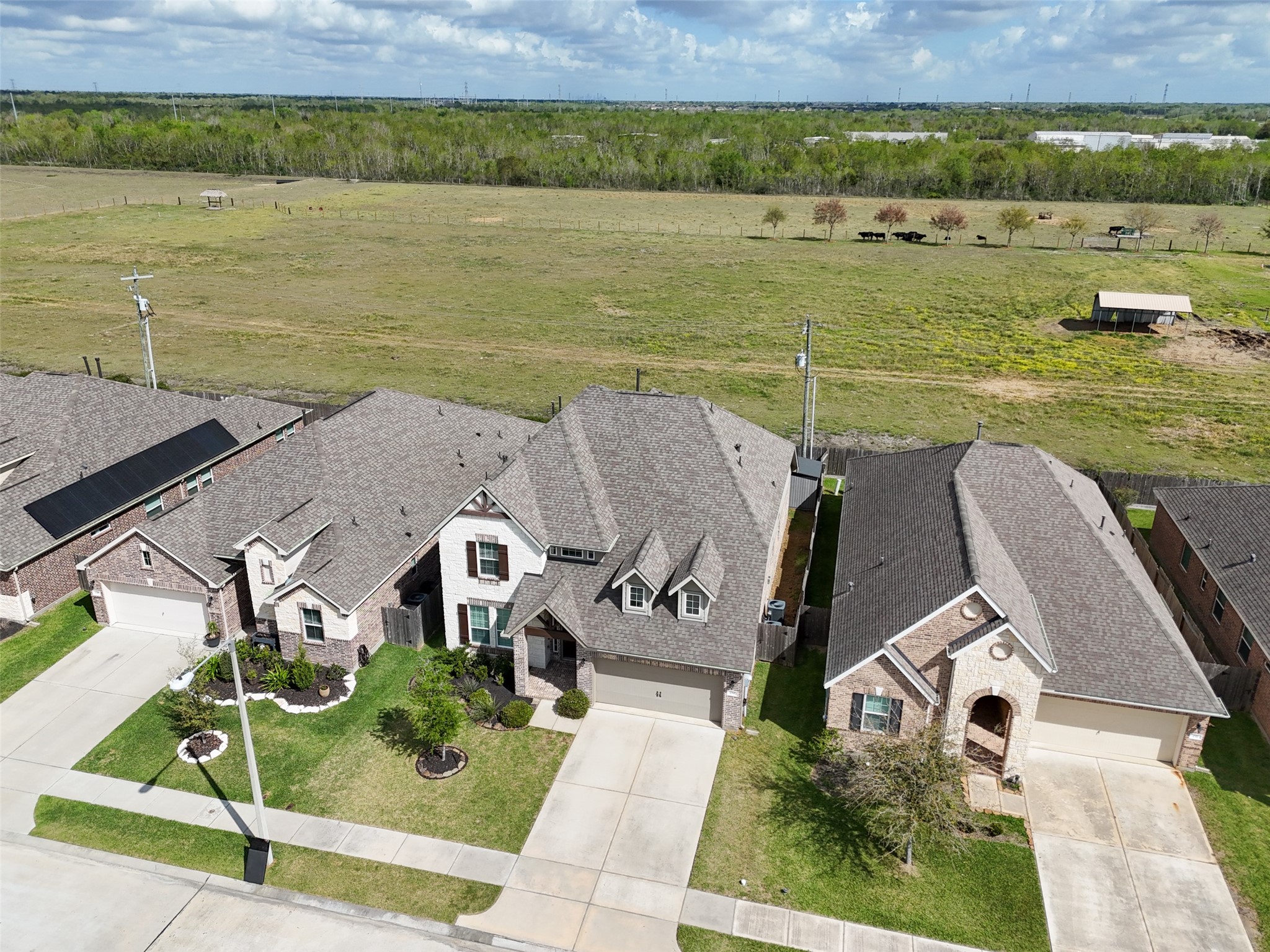 234 Ashley Way Alvin, TX 77511 - Photo 41 of 42 a view of a lake with a yard
