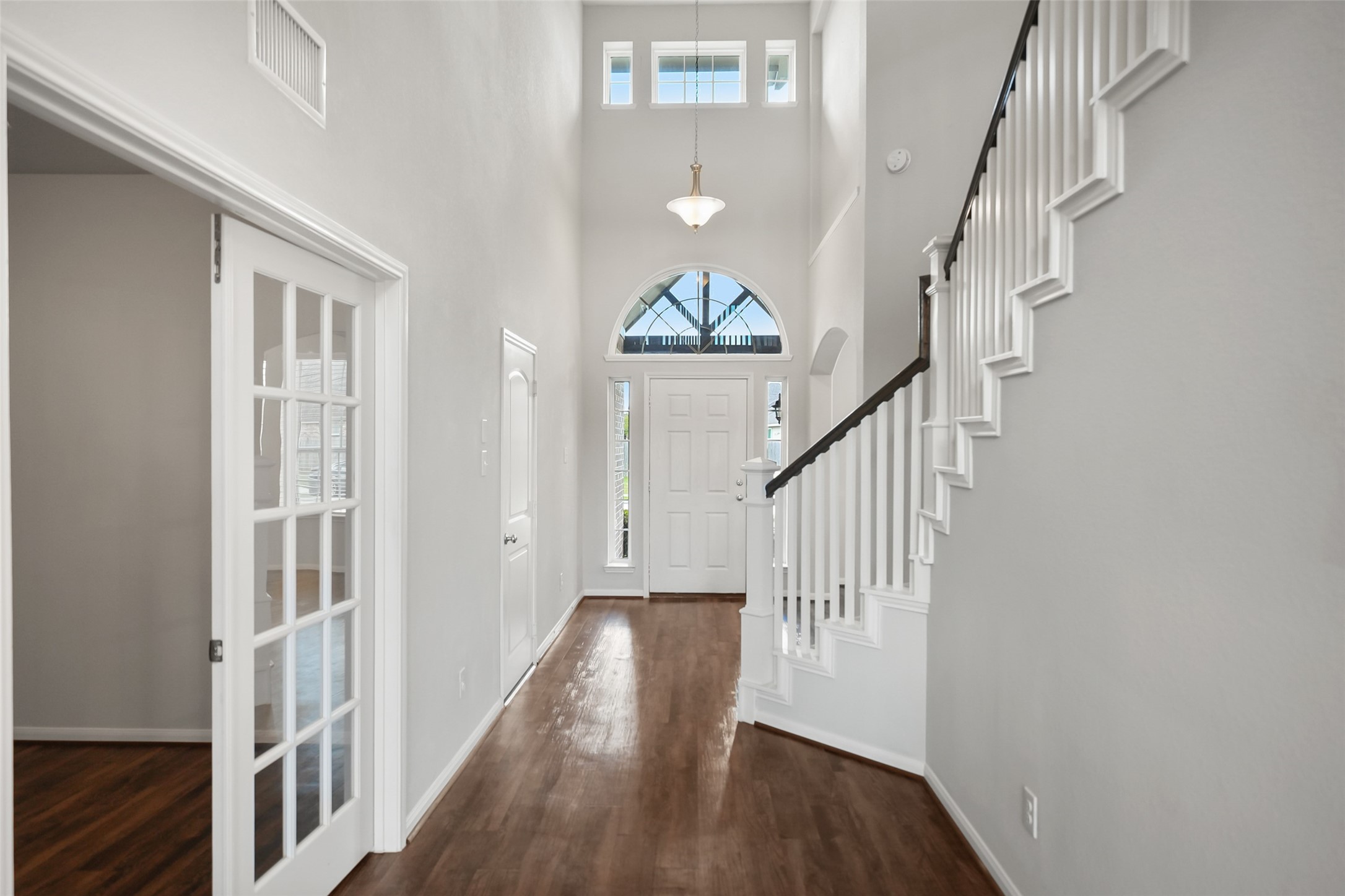 234 Ashley Way Alvin, TX 77511 - Photo 9 of 42 a view of entryway with wooden floor