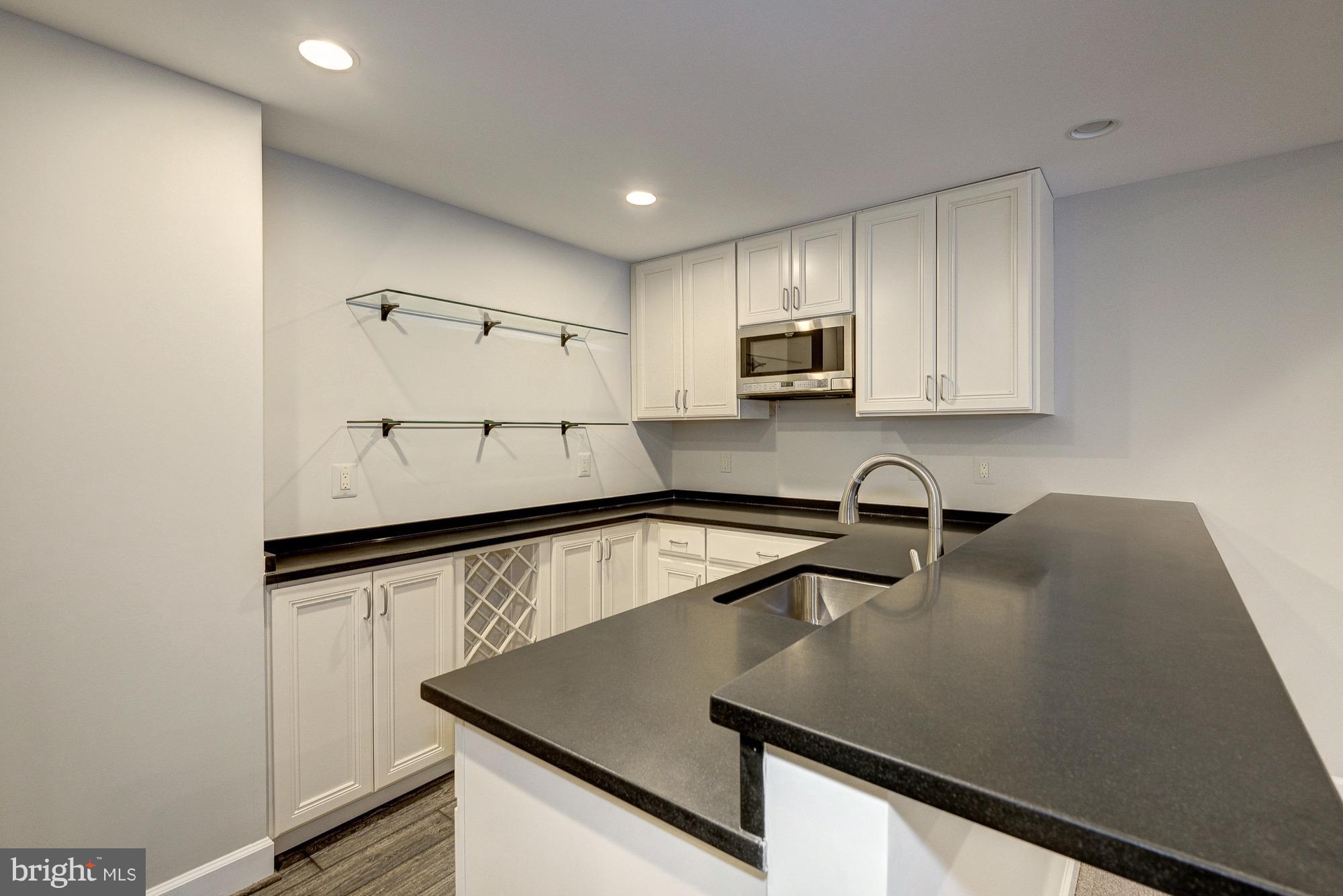 2552 Vale Ridge Court Oakton, VA 22124 - Photo 25 of 30 Walk-behind wet bar