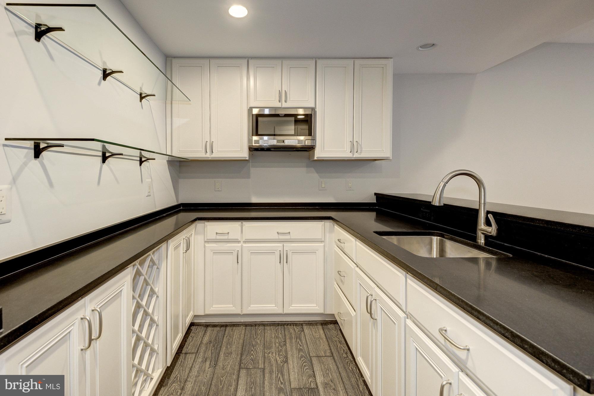 2552 Vale Ridge Court Oakton, VA 22124 - Photo 26 of 30 Walk-behind wet bar