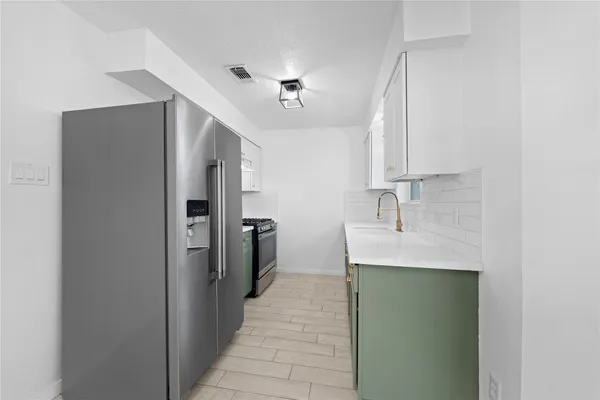 a view of a livingroom with a hardwood floor