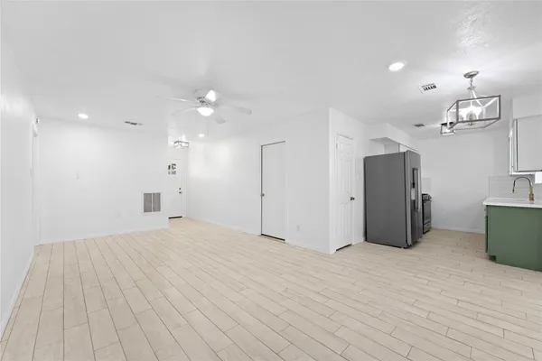 a bathroom with a double vanity sink and mirror