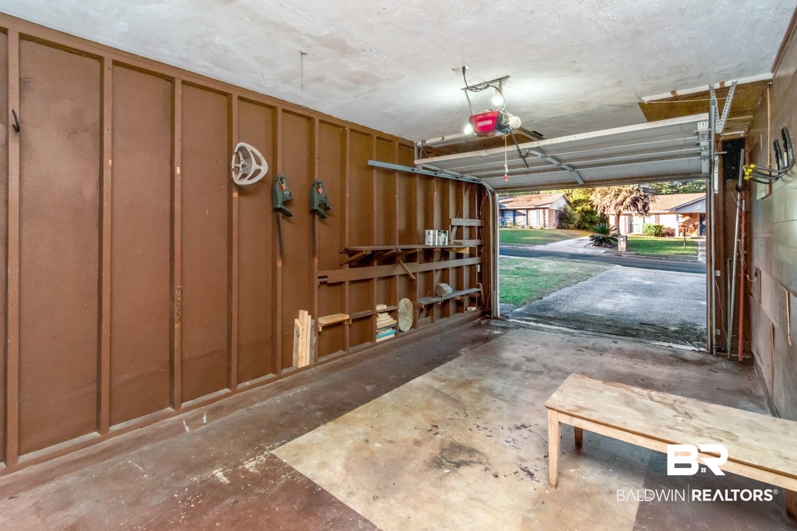 5517 Vanderbilt Drive Mobile, AL 36608 - Photo 33 of 33 Garage with a garage door opener