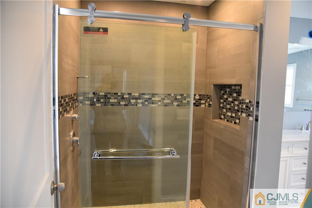 171 East Cliff Road Colonia, NJ 07067 - Photo 12 of 25 a bathroom with a shower