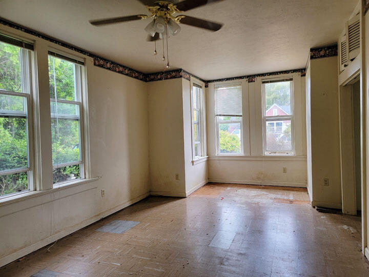 120 13th Street Arcata, CA 95521 - Photo 13 of 37 a view of livingroom with window ceiling fan and hardwood floor