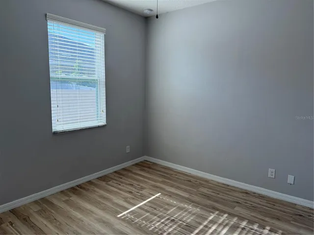 a view of a room that has a window