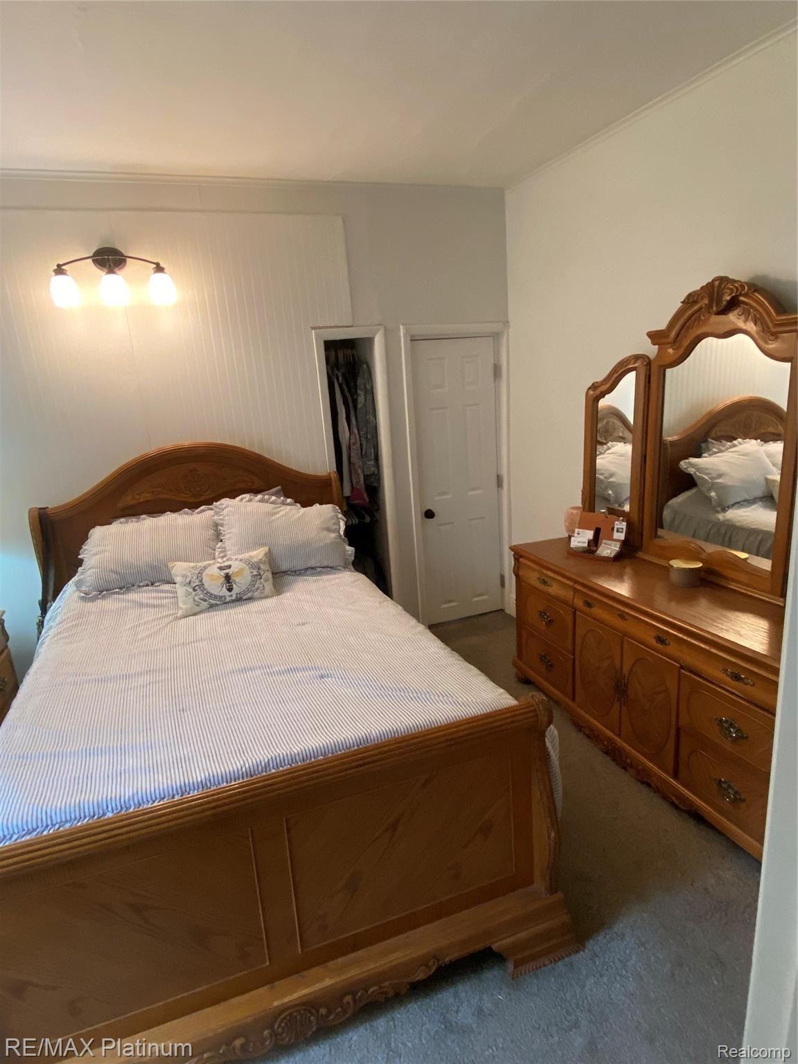 1976 Oak Grove Road Howell, MI 48855 - Photo 8 of 16 FIRST FLOOR BEDROOM