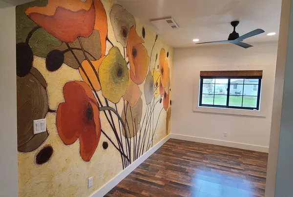 a view of an empty room with a window