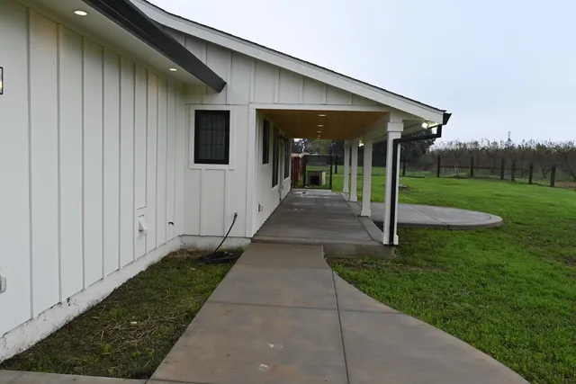 a view of a patio in front of house
