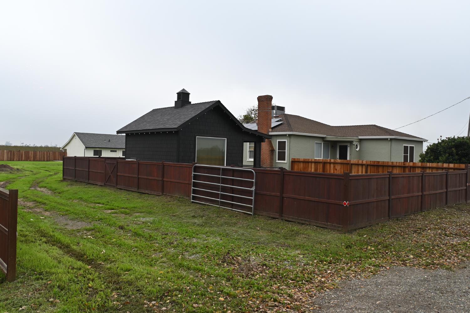 1102 Barry Road Yuba City, CA 95991 - Photo 47 of 72 a front view of a house with a garden