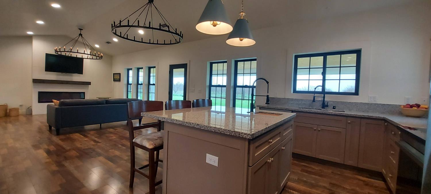 1102 Barry Road Yuba City, CA 95991 - Photo 10 of 72 a kitchen with lots of counter top space and a window