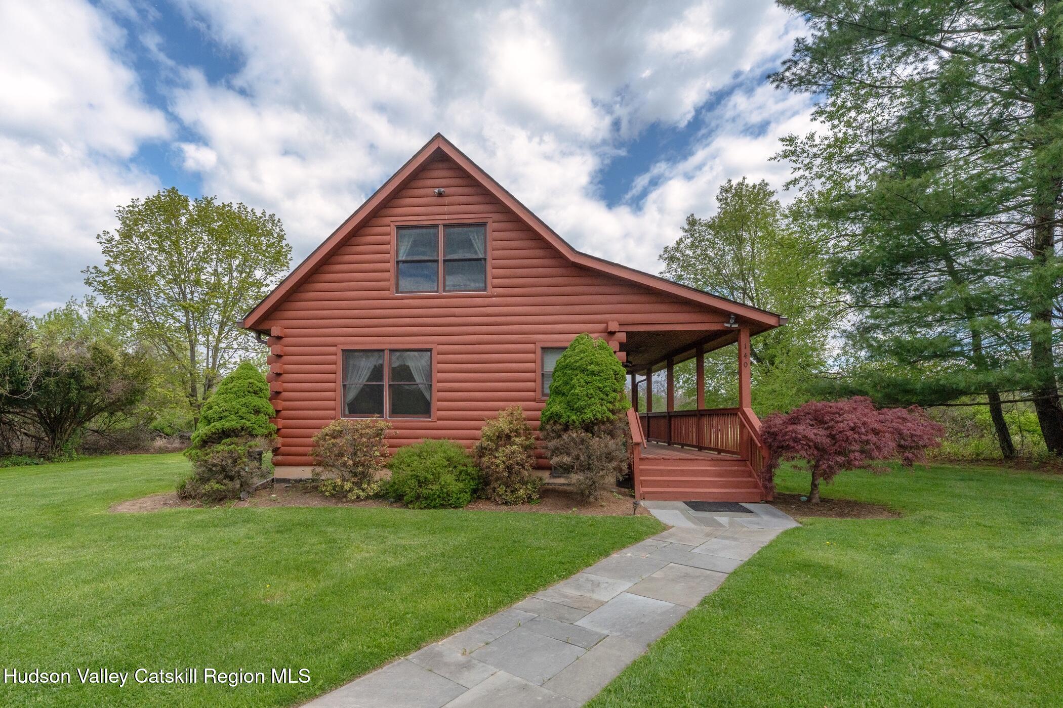 140 Stone Dock Road High Falls, NY 12440 - Photo 39 of 42 a front view of house with a garden