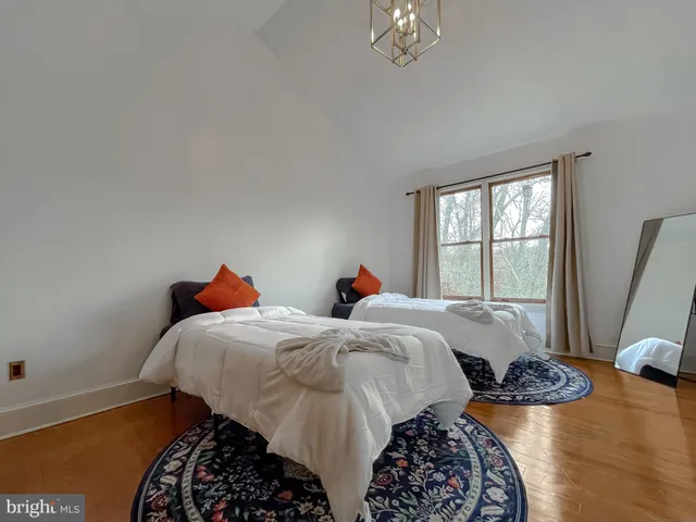 a room with pool table and a window