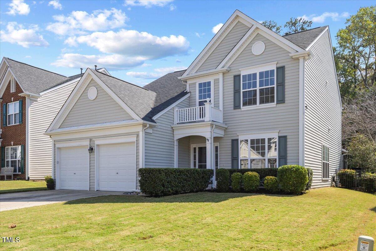 5415 Regatta Way Raleigh, NC 27613 - Photo 3 of 40 a view of a house with a swimming pool and a yard