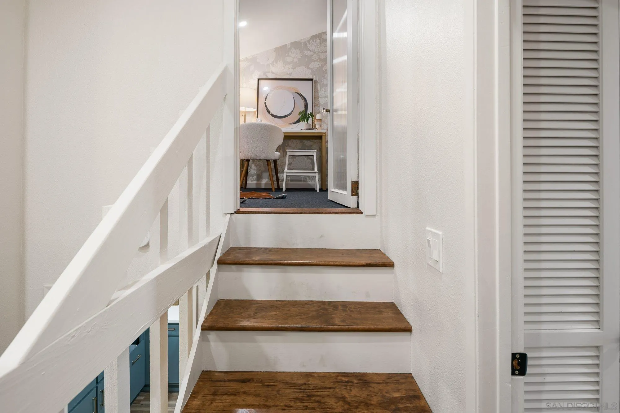 2352 Altisma Way, Unit 15 Carlsbad, CA 92009 - Photo 34 of 42 a view of entryway and hall with wooden floor