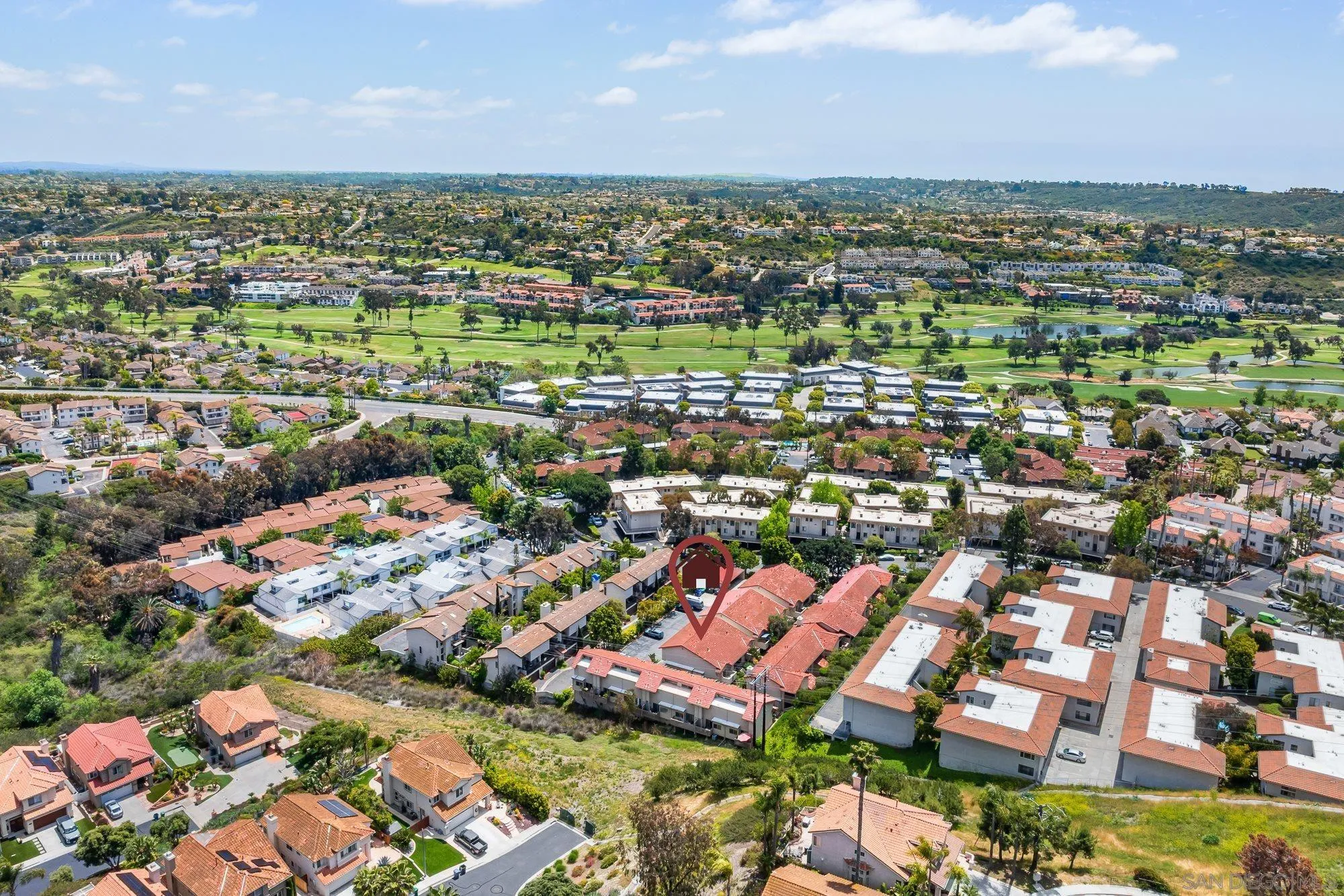 2352 Altisma Way, Unit 15 Carlsbad, CA 92009 - Photo 40 of 42 an aerial view of residential houses with outdoor space and trees