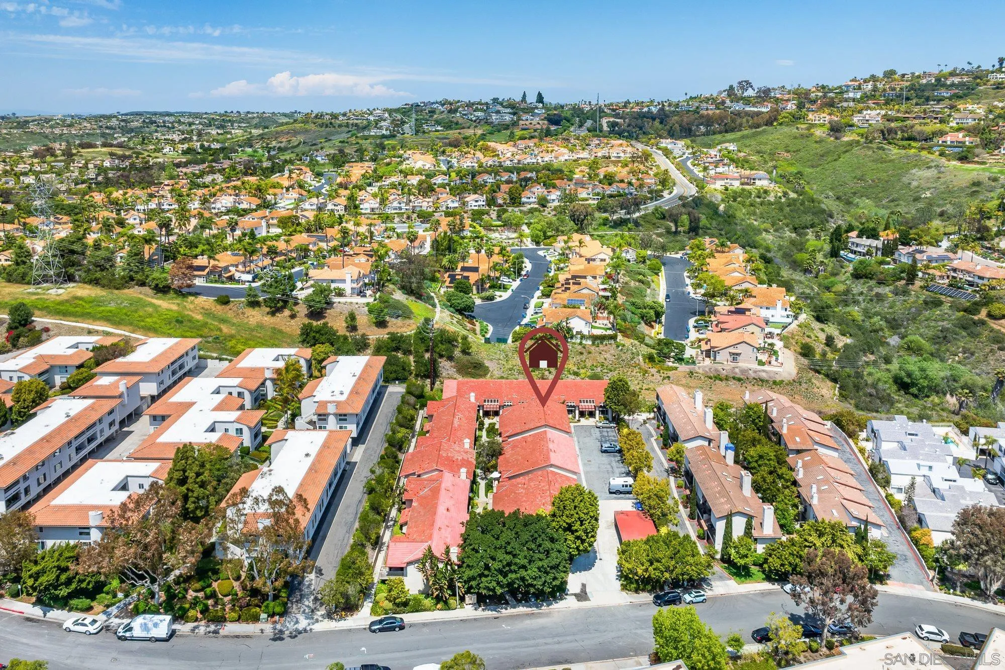 2352 Altisma Way, Unit 15 Carlsbad, CA 92009 - Photo 4 of 42 an aerial view of residential building with outdoor space