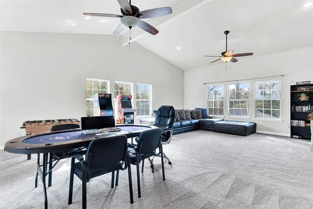 a view of a livingroom with furniture and a table