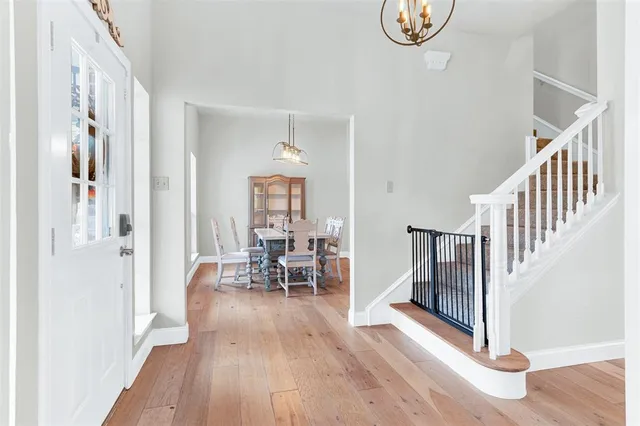 a view of dining room with wooden floor