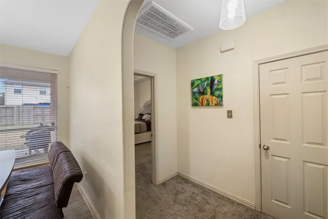 a view of hallway with walk in closet