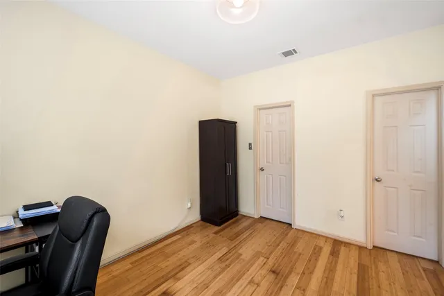 a view of room with hardwood floor