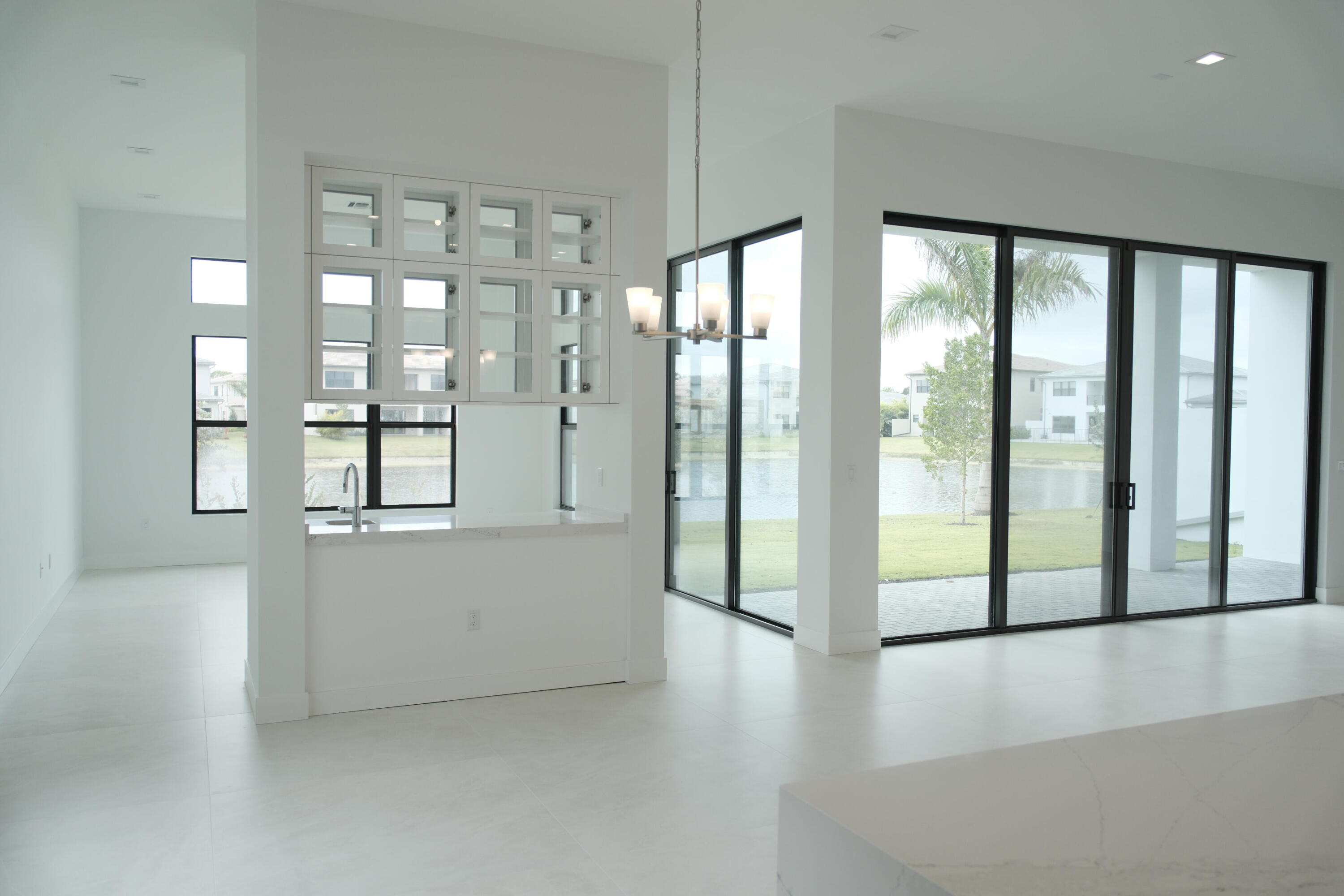 9516 Riverside Pk Drive Boca Raton, FL 33434 - Photo 15 of 24 a view of an entryway with wooden floor