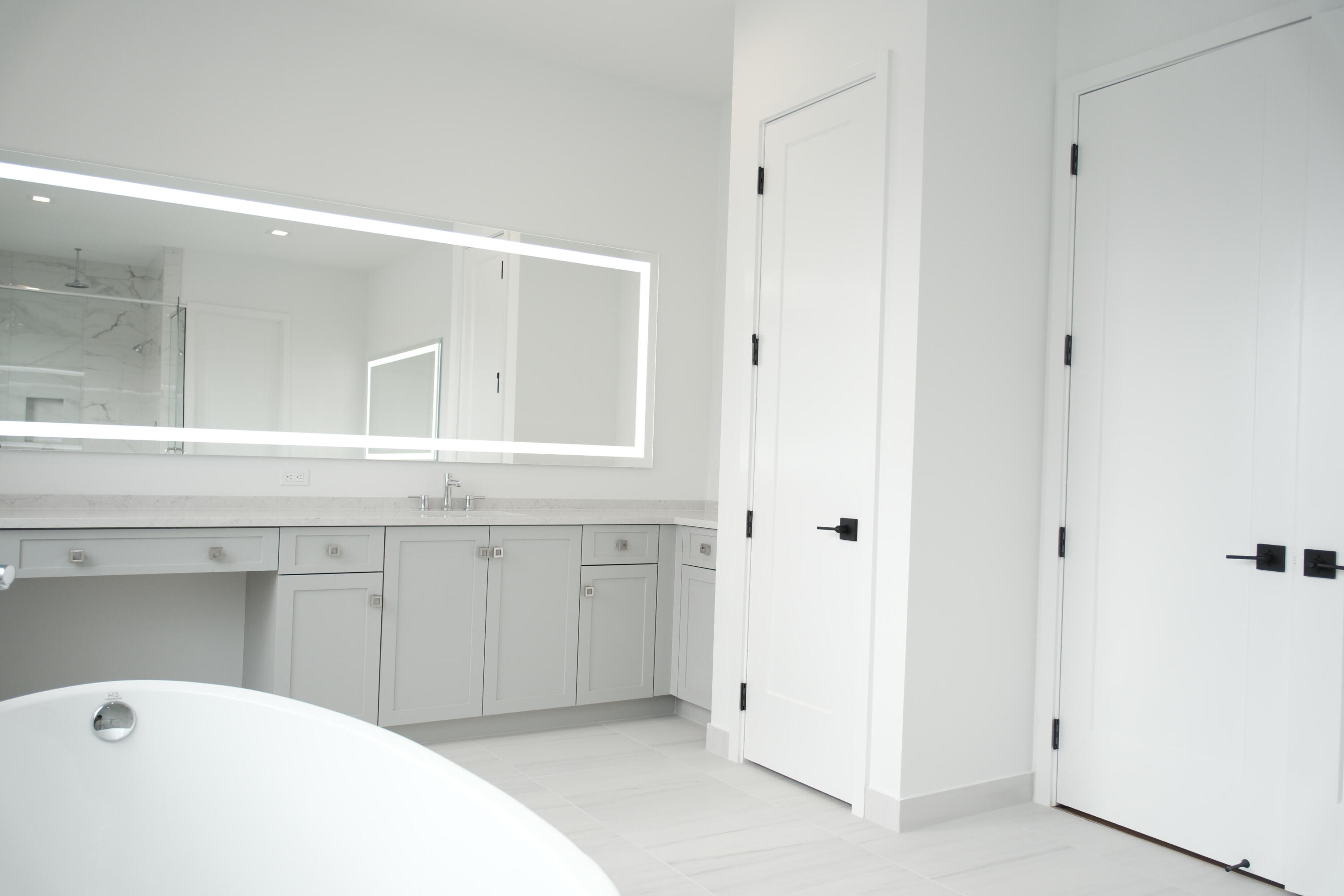 9516 Riverside Pk Drive Boca Raton, FL 33434 - Photo 20 of 24 a bathroom with a sink and a mirror