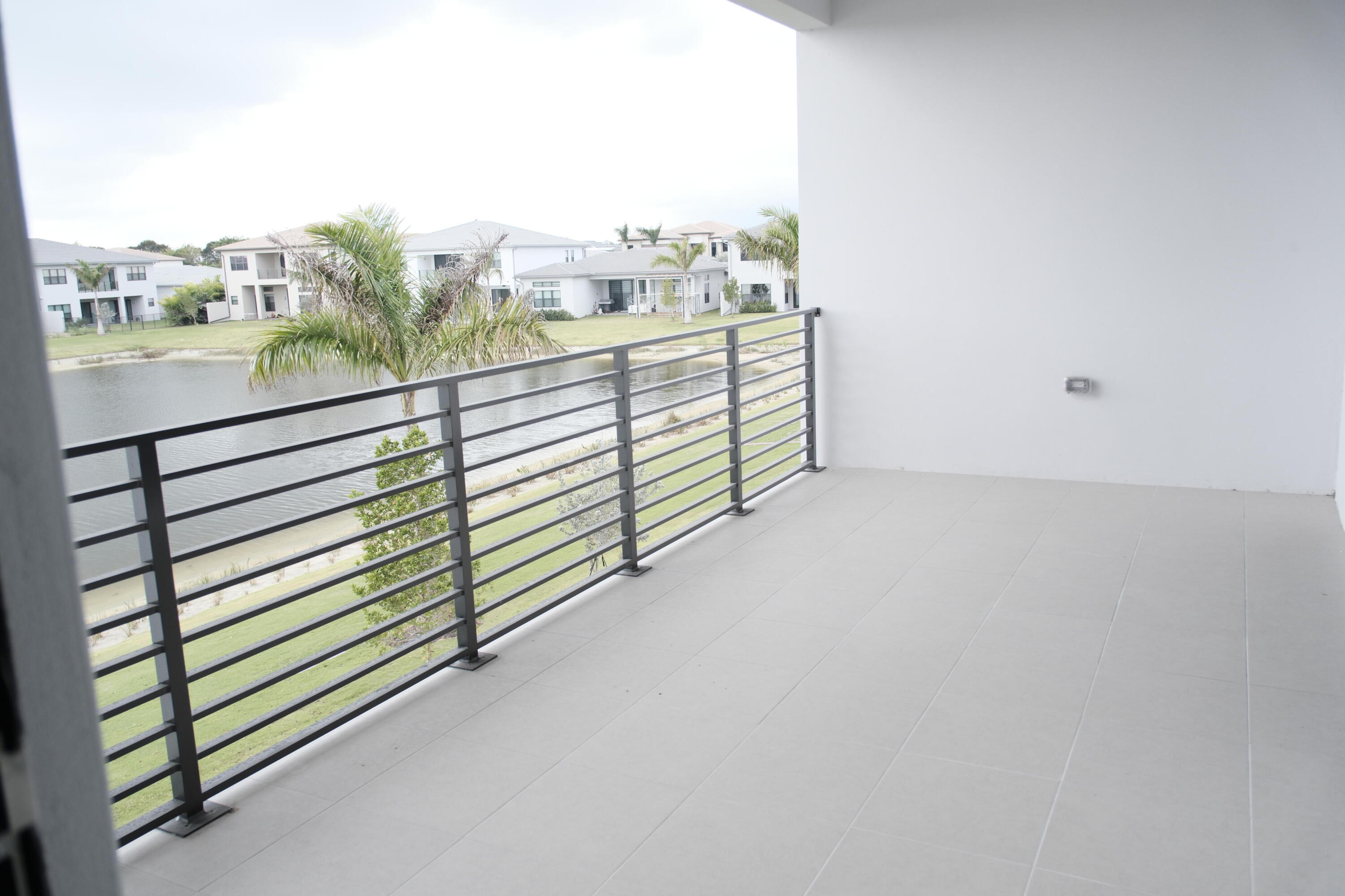 9516 Riverside Pk Drive Boca Raton, FL 33434 - Photo 21 of 24 a view of a balcony with city view