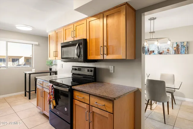 a view of a dining room with furniture